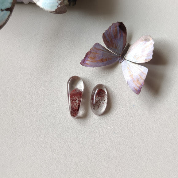Clear Quartz Cabochons with Hematite Ghost Inclusions