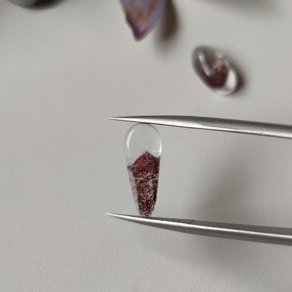 Clear Quartz Cabochons with Hematite Ghost Inclusions
