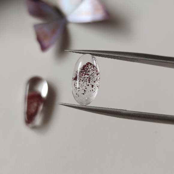 Clear Quartz Cabochons with Hematite Ghost Inclusions