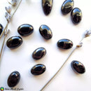 Oval Black Onyx Cabochons - Anima Mundi Crystals