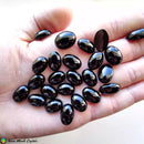 Oval Black Onyx Cabochons - Anima Mundi Crystals